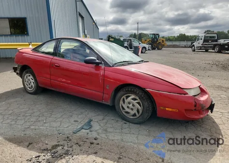1999 Saturn Sc1 z USA, uszkodzony, nr VIN 1G8ZP1287XZ243932